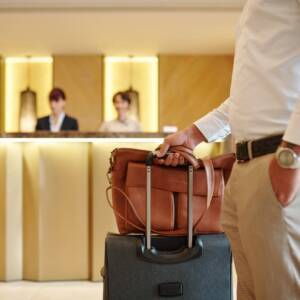 Hotel guest standing in lobby